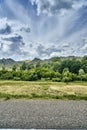 Beautiful landscape of steppe and stone mountains along the road from the city of Ust-Kamenogorsk to the Sibiny lakes RU: