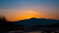 Beautiful landscape stones in mountain lake, reflection, blue sky and yellow sunlight in sunrise. Ukraine. Amazing scene Royalty Free Stock Photo