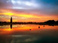 Beautiful landscape of sunset reflected on a lake over the mountains Royalty Free Stock Photo