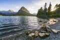 Beautiful landscape at Swiftcurrent Lake  when sunrise in Many Glacier area ,Montana`s Glacier National Park,Montana,usa Royalty Free Stock Photo