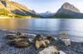 Beautiful landscape at Swiftcurrent Lake  when sunrise in Many Glacier area ,Montana`s Glacier National Park,Montana,usa Royalty Free Stock Photo