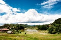 Beautiful landscape of Tana Toraja, South Sualwesi, Indonesia. Rice fields with water, mountains, blue sky with clouds.