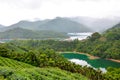 Beautiful landscape by Thousand Island Lake with Pinglin Tea Plantation in Taiwan. Surrounded by green tropical forest. Turquoise Royalty Free Stock Photo