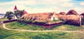 Beautiful landscape with traditional wooden houses with moss-covered roofs and church in Pioneer Museum in Glaumbaer, Iceland.