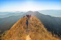 Beautiful landscape with trekkers walking on mountain ridge in sunset at Thong Pha Phum National Park Kanchanaburi of Thailand Royalty Free Stock Photo