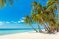 Beautiful landscape of tropical beach on Boracay island, Philippines. Coconut palm trees, sea, sailboat and white sand. Nature Royalty Free Stock Photo