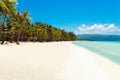 Beautiful landscape of tropical beach on Boracay island, Philippines. Coconut palm trees, sea, sailboat and white sand. Nature Royalty Free Stock Photo