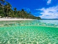 Beautiful landscape on the tropical beach of Boracay island, Philippines. Coconut trees, sea, sailboat and white sand. View of Royalty Free Stock Photo