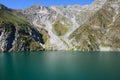 Beautiful landscape with turquoise lake, forest and mountains Royalty Free Stock Photo