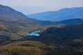 Beautiful landscape with turquoise lake, forest and mountains Royalty Free Stock Photo