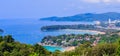 Beautiful landscape of turquoise ocean waves with boats, coastline and blue sky background from high aerial view point Royalty Free Stock Photo