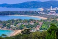 Beautiful landscape of turquoise ocean waves with boats, coastline and blue sky background from high aerial view point Royalty Free Stock Photo