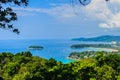 Beautiful landscape of turquoise ocean waves with boats, coastline and blue sky background from high aerial view point Royalty Free Stock Photo