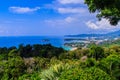 Beautiful landscape of turquoise ocean waves with boats, coastline and blue sky background from high aerial view point Royalty Free Stock Photo