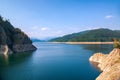 A beautiful landscape with the Vidra lake. Transfagarasan Road. The calm water of the storage lake Vidra Royalty Free Stock Photo