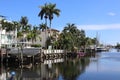 Beautiful landscape view of a canal waterway with luxury homes and boat docks in Fort Lauderdale