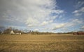 Beautiful landscape view with fields, forest trees and blue sky with white clouds. Gorgeous spring backgrounds Royalty Free Stock Photo