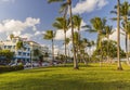 Beautiful landscape view of Miami South Beach. Buildings on one side and palm trees on another side. Royalty Free Stock Photo