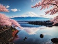 Beautiful landscape view of Mt.Fuji covered with white snow lake and cherry blossom sakura