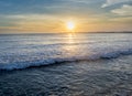 Beautiful landscape view of the ocean during sunset time on the beach Royalty Free Stock Photo