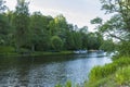 Beautiful landscape view of river with green forest trees on both sides. Royalty Free Stock Photo