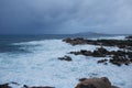 Beautiful landscape view of the rocky coast of the Atlantic Ocean during a cloudy sunset. Spain Royalty Free Stock Photo