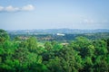 Beautiful landscape view in summer seasonal of green trees with mountain and blue sky in the background. Royalty Free Stock Photo