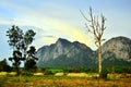 Beautiful  landscape view of sundown , mountain , tree and field in Thailand Royalty Free Stock Photo