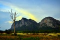 Beautiful  landscape view of sundown , mountain , tree and field in Thailand Royalty Free Stock Photo