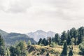 Beautiful landscape view to the Colorado mountains with green forests and snow on top, mountain river. Small village in Aspen Royalty Free Stock Photo