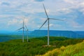 Beautiful landscape view of wind power turbine among mountain hill with blue sky in the early morning, Wind turbines on sunny Royalty Free Stock Photo