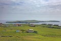 Beautiful landscape with villages & houses & islands in the background, Shetland Islands, Scotland Royalty Free Stock Photo