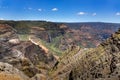 Beautiful landscape in Waimea Canyon State Park Hawaii with rocky cliffs and hills Royalty Free Stock Photo