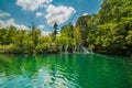 Waterfall and clear green water in the Plitvice Lakes National Park in Croatia. Beautiful world. Royalty Free Stock Photo