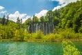 Waterfall and clear green water in the Plitvice Lakes National Park in Croatia. Beautiful world. Royalty Free Stock Photo