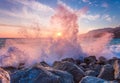 Beautiful landscape with waves crashing against coastal stones Royalty Free Stock Photo