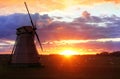 Beautiful Landscape with a Windmill at Sunset Royalty Free Stock Photo