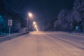 Beautiful landscape. Winter night in the sleeping city. Deserted road.