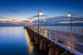 Beautiful landscape with wooden pier in Gdynia Orlowo at sunrise, Poland Royalty Free Stock Photo