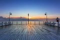 Beautiful landscape with wooden pier in Gdynia Orlowo at sunrise, Poland Royalty Free Stock Photo