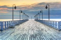 Beautiful landscape with wooden pier in Gdynia Orlowo at sunrise, Poland Royalty Free Stock Photo