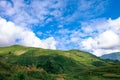 The beautiful landscape of Y Ty with mountains, clouds, blue sky, and rice fields, the most popular destination in Sapa, Vietnam. Royalty Free Stock Photo