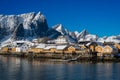 Beautiful landscape from yellow rorbu houses of Sakrisoy fishing village under blue sky in winter season, Lofoten islands, Norway Royalty Free Stock Photo