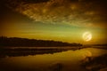 Night sky and bright full moon at riverside. Serenity nature background Royalty Free Stock Photo