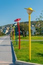 Beautiful lane at Caspian Sea boulevard with colorful funny humanlike lanterns, Baku Royalty Free Stock Photo