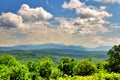 Beautiful lansdcape with blue cloudy sky in Caucasus mountains