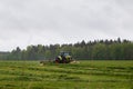 Beautiful lansdscape with haymaking Royalty Free Stock Photo