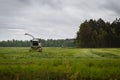 Beautiful lansdscape with haymaking or combine a field Royalty Free Stock Photo