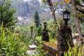 Beautiful lanterns on a stone fence in a summer park