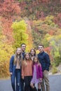 Beautiful Family Portrait with fall colors in the background Royalty Free Stock Photo